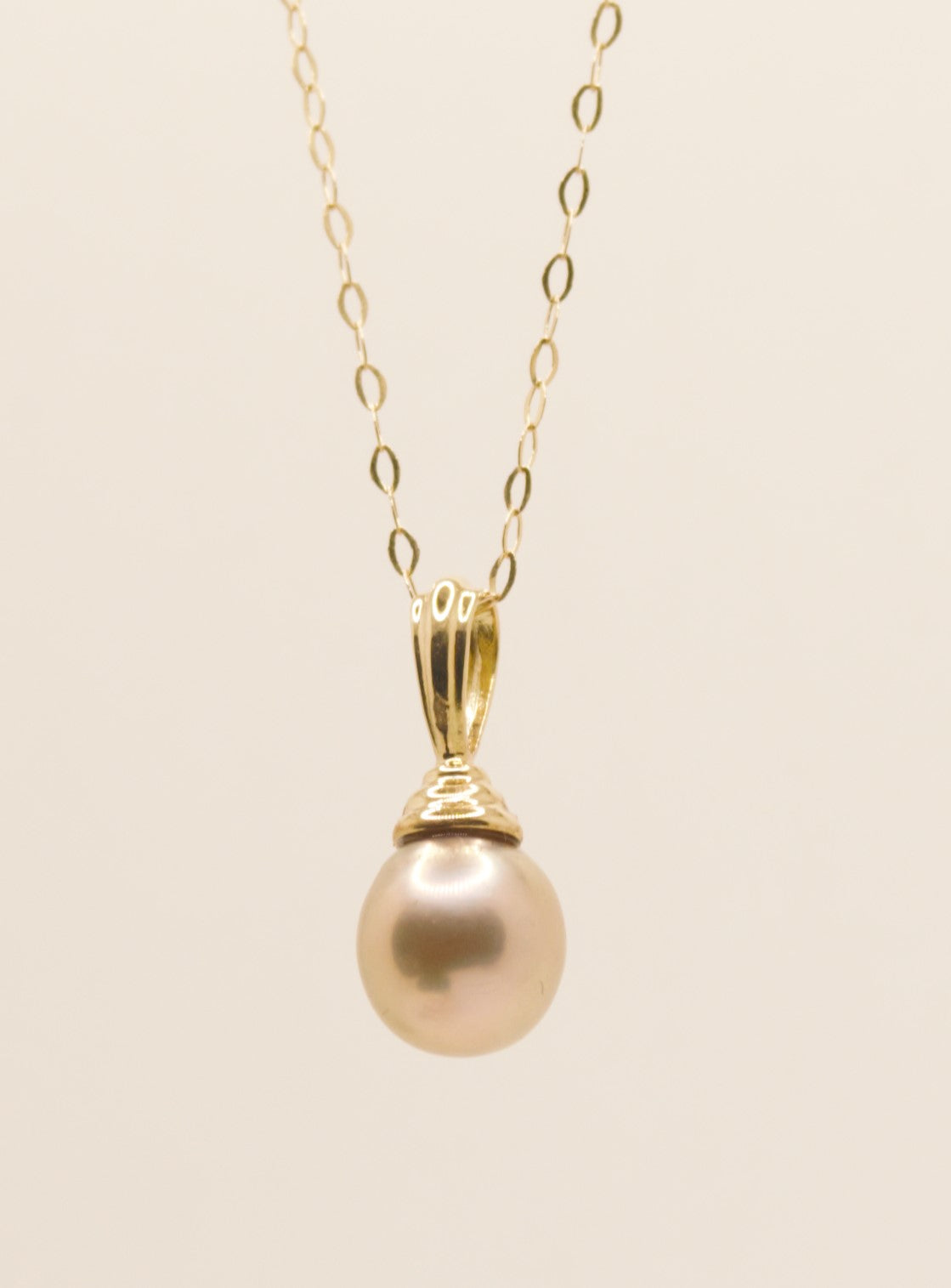 Pendentif Or Jaune 750° et perle de culture rose/violette