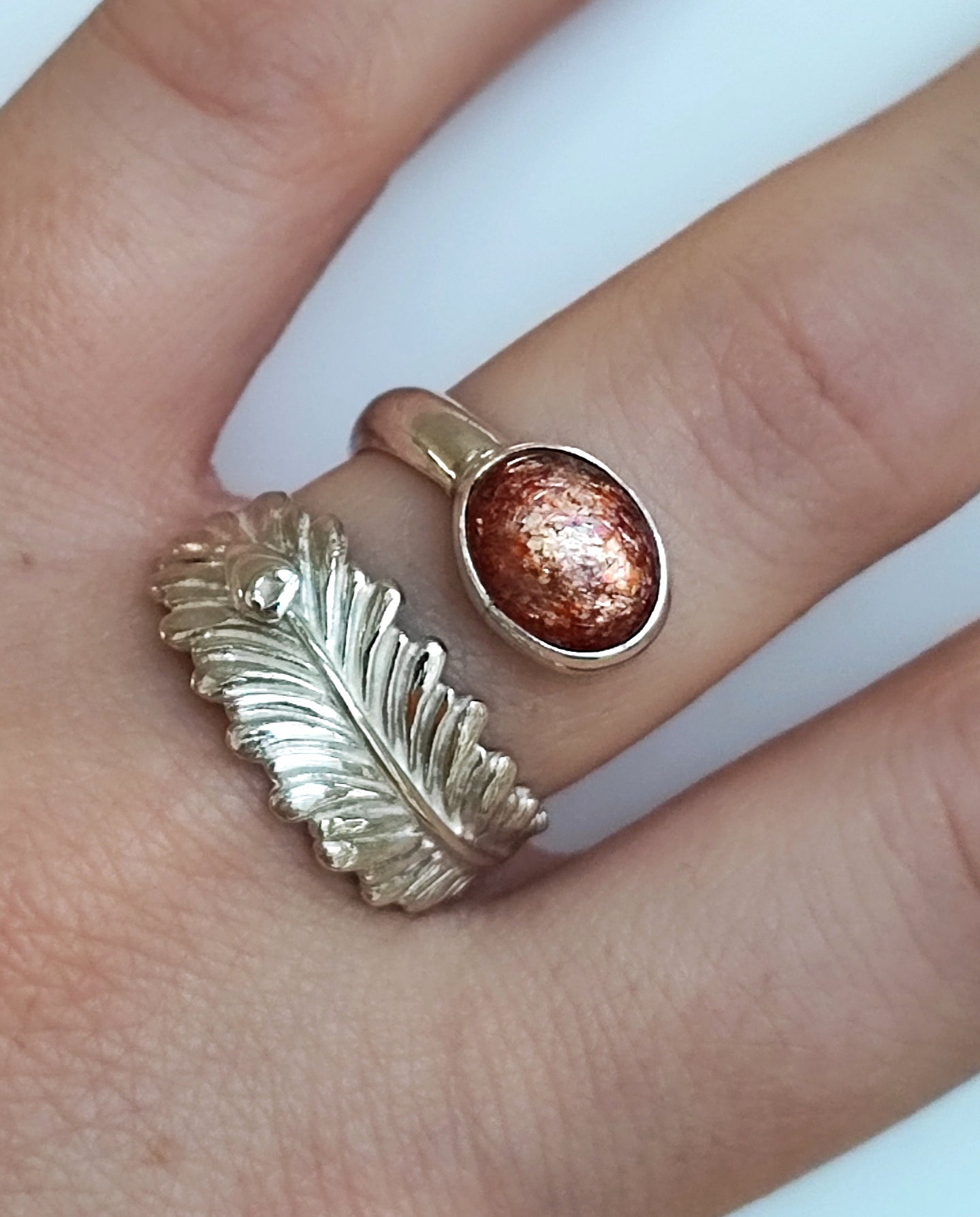 Bague plume de paon argent et pierre du soleil