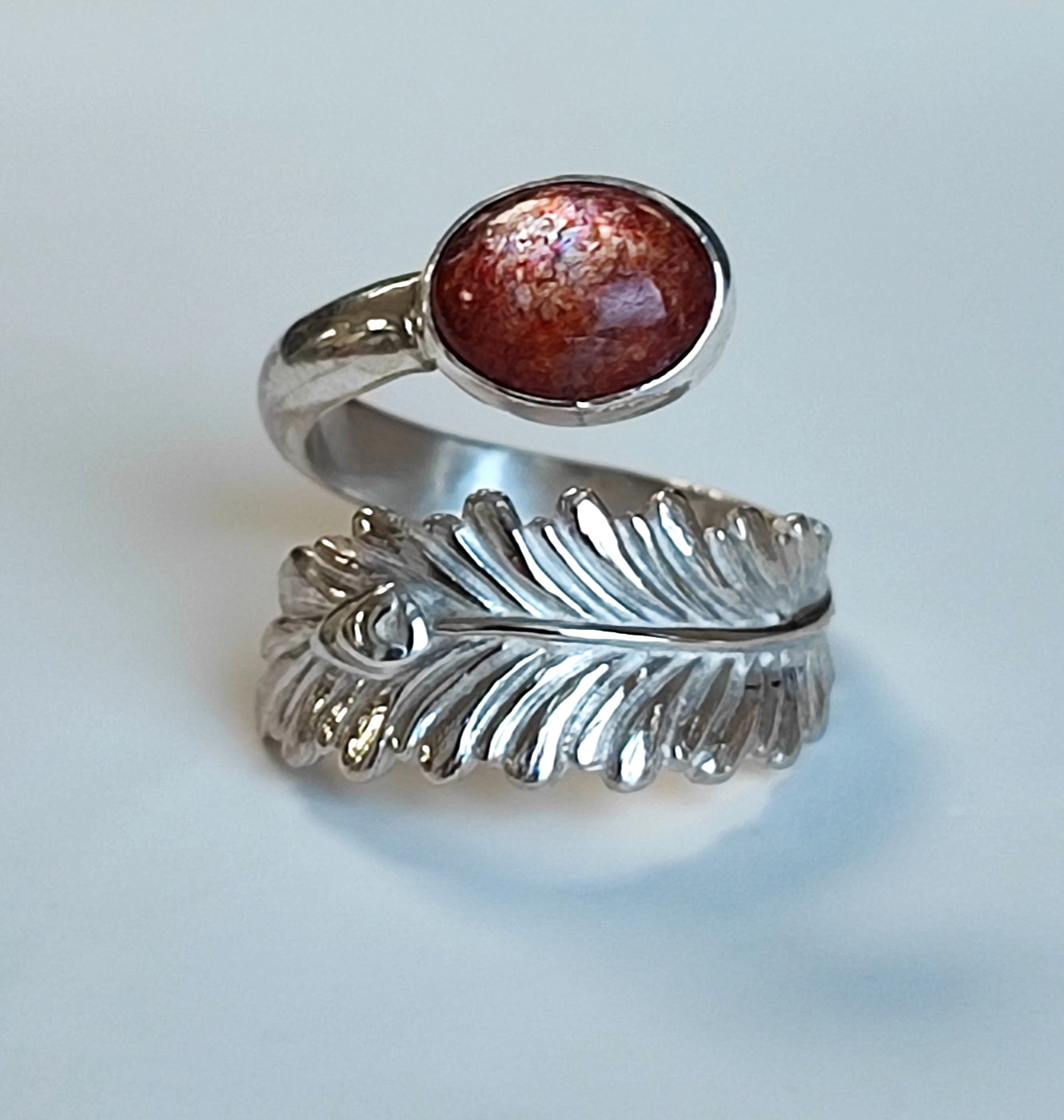 Bague plume de paon argent et pierre du soleil